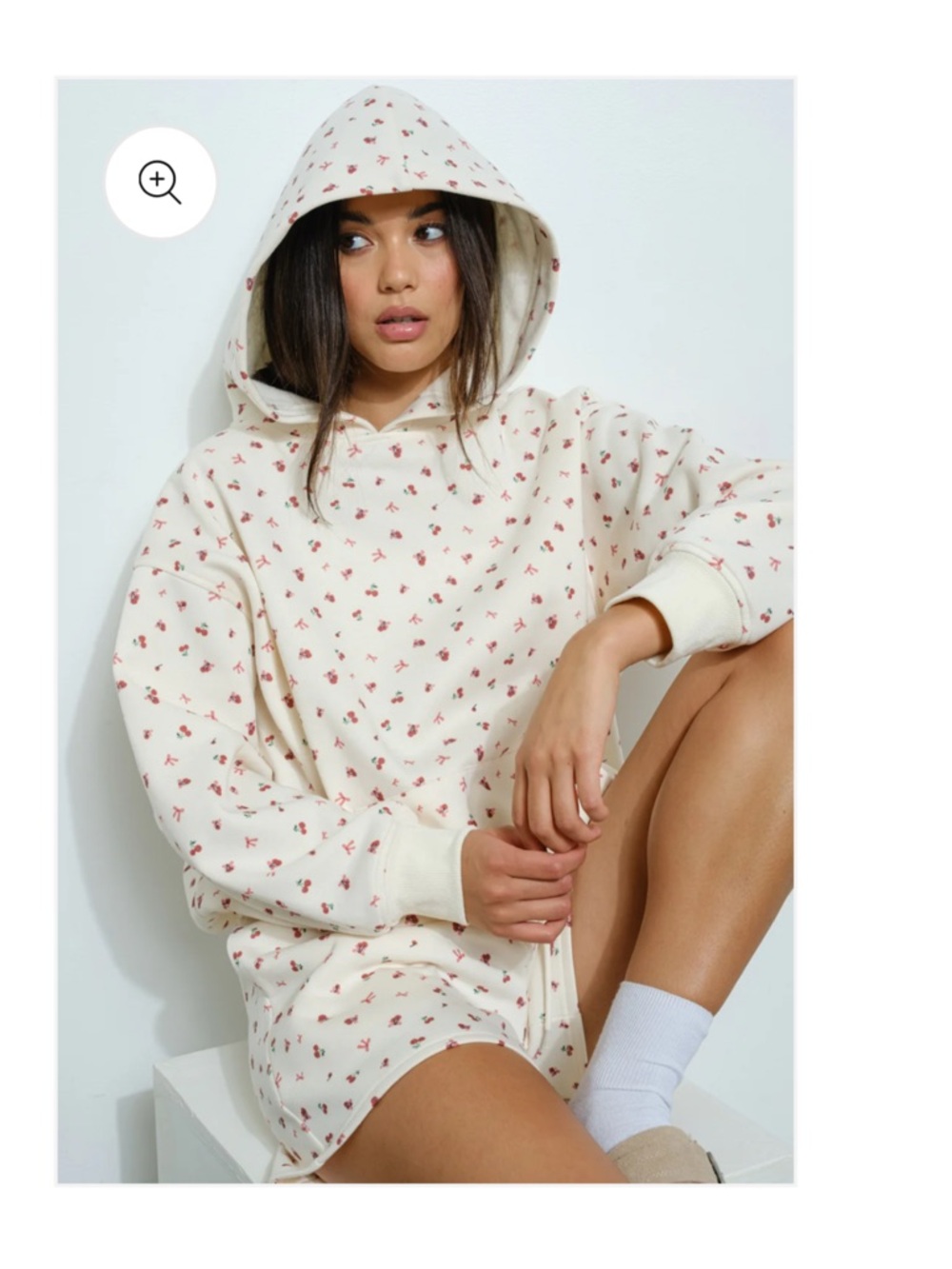 loungewear set featuring a hoodie and shorts with a cherry pattern.